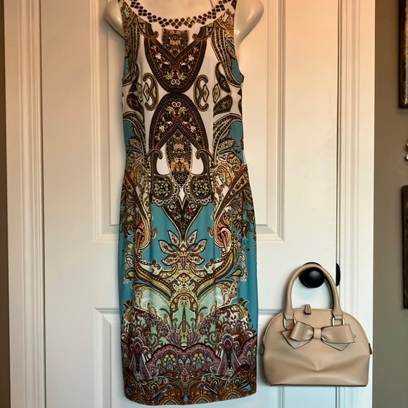 Joseph Ribkoff Dresses & Skirts - Fabulous Joseph Ribkoff cream with teal print sleeveless dress.